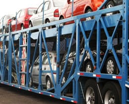 Cars being transported in a huge truck