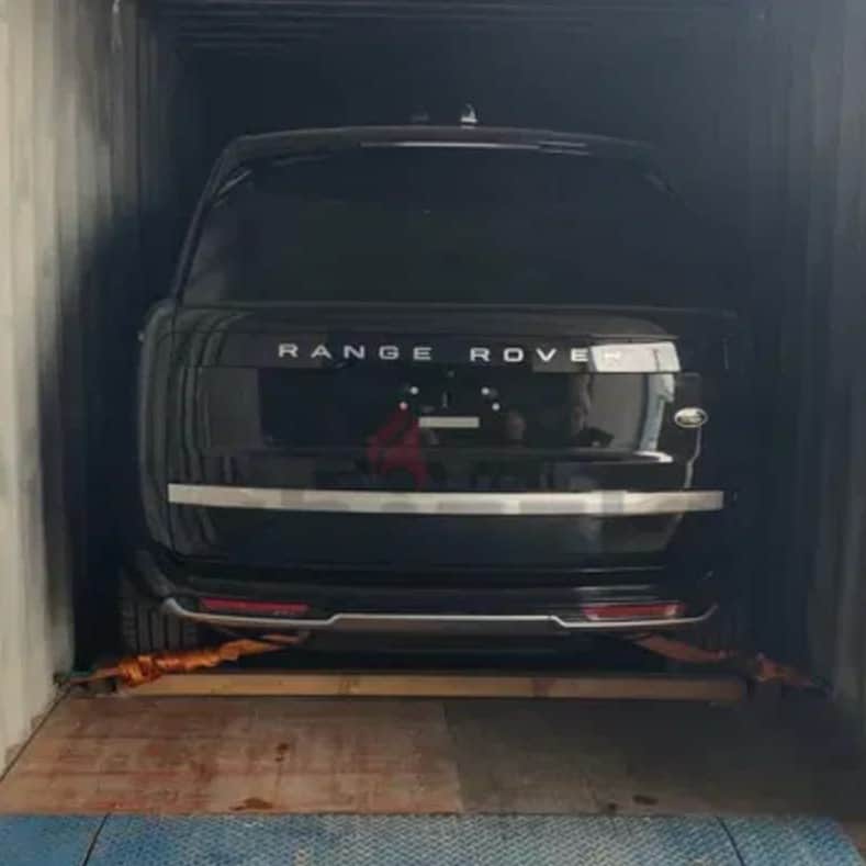 A car loaded in to a shipping container